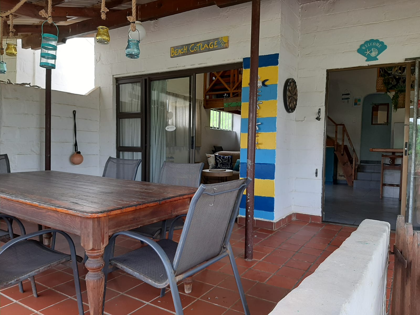 Patio of the Beach Cottage opening into the 2nd lounge